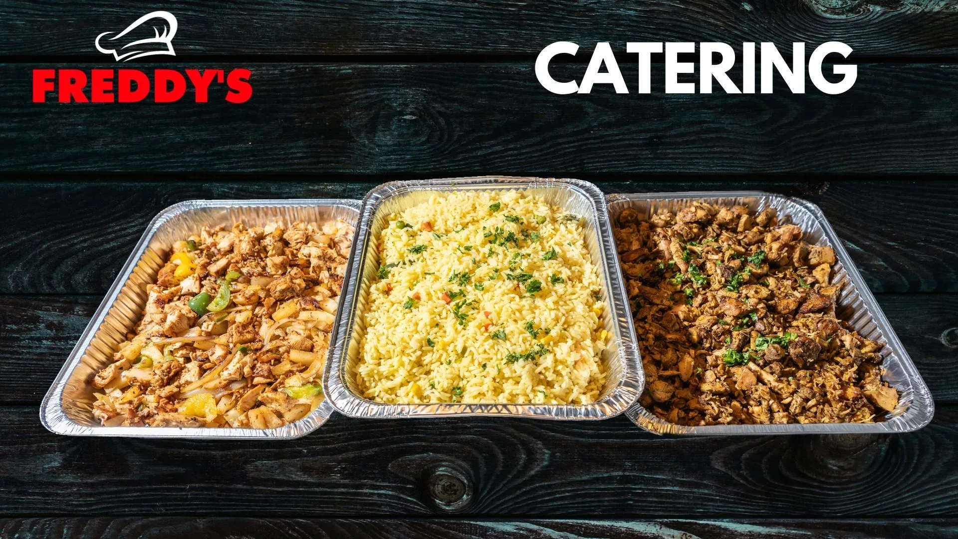 Freddy's catering spread: chicken, rice, and shawarma trays